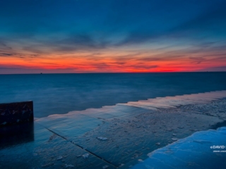 Blue Water - Red Sunrise at Montrose and Lake Michigan Chicago