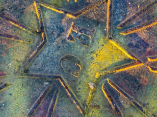 Starburst Sewer Cover