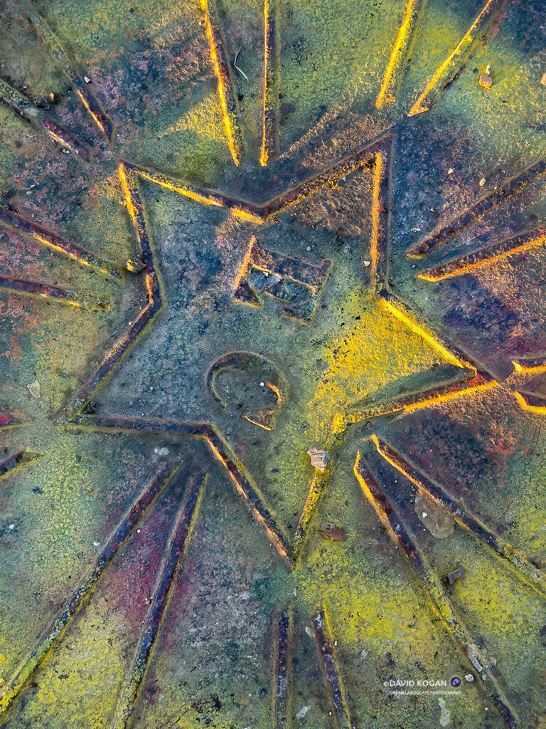 Rainbow Sewer Cover Starburst Sewer Cover